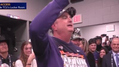 Sonny Dykes gives a speech in the locker room
