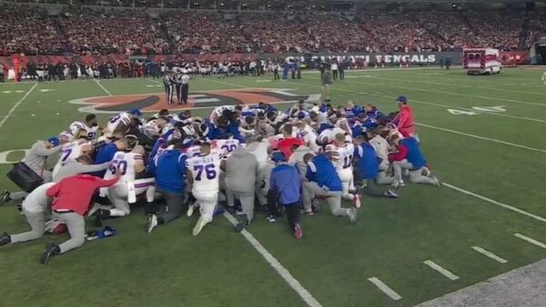 Bills players gather around