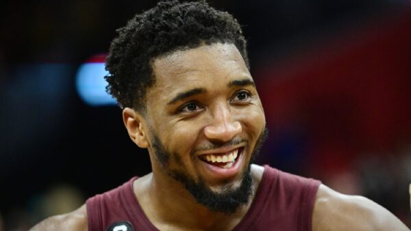 Donovan Mitchell smiling in a Cavaliers uniform