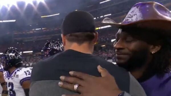 Matthew Stafford and LaDainian Tomlinson embracing