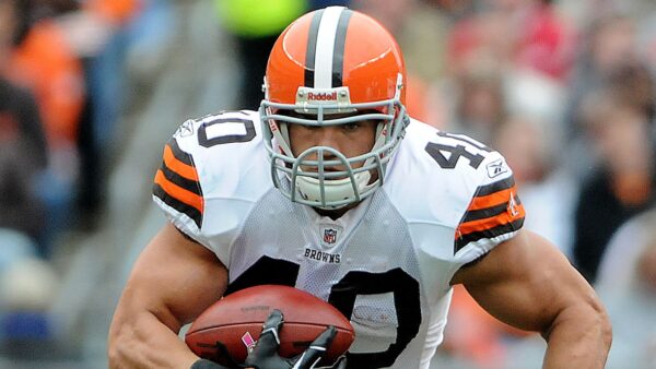 Peyton Hillis holding the ball