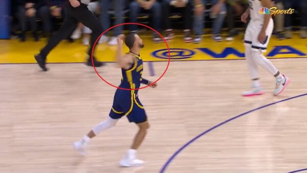 Steph Curry throws his mouthpiece