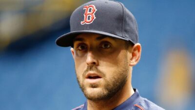 Travis Shaw in a Red Sox hat