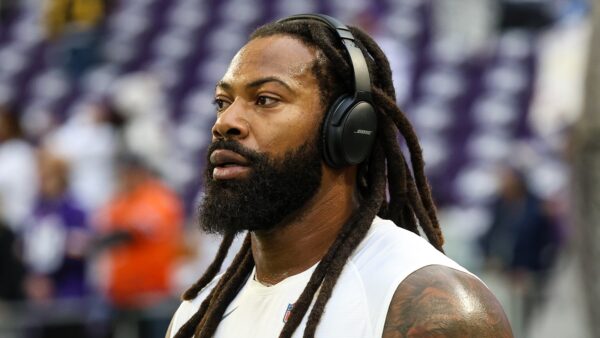 Za'Darius Smith wearing headphones