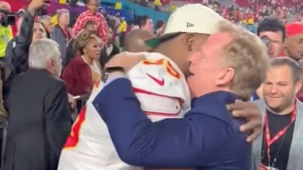 Roger Goodell and Chris Jones hug after the Super Bowl