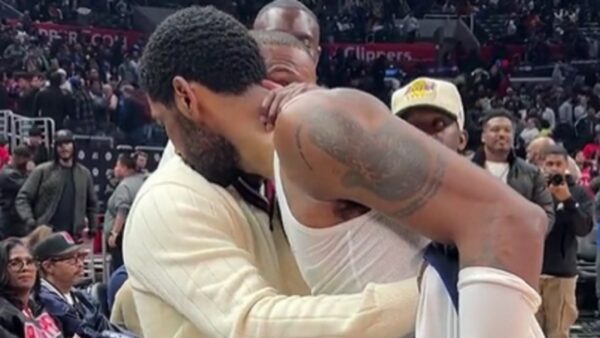 Floyd Mayweather Jr. embraces Kyrie Irving