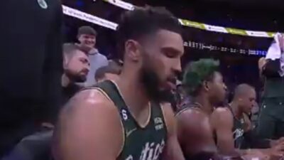 Jayson Tatum sitting on the bench