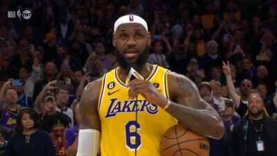 LeBron James holds a microphone