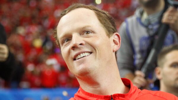 Major Applewhite grinning