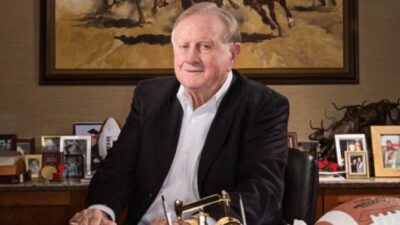 Red McCombs in his office