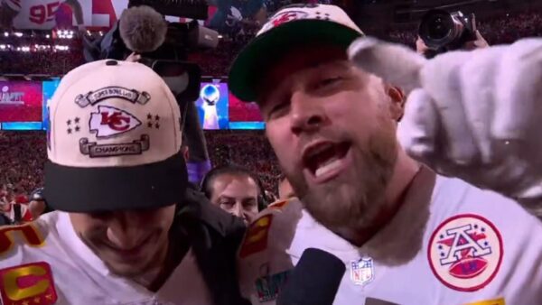 Travis Kelce pointing at the camera