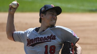 Kenta Maeda throwing a pitch