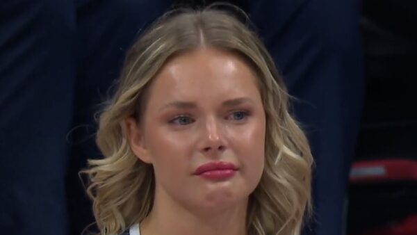 A Utah State cheerleader crying