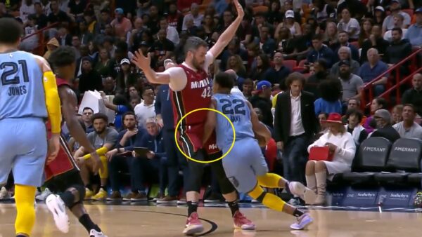 Desmond Bane hits Kevin Love in the groin