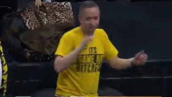 Missouri fan in a yellow shirt
