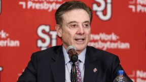 Rick Pitino in a suit