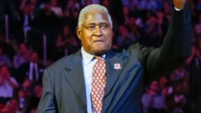 Willis Reed in a suit