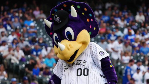 The Rockies mascot dances during a game