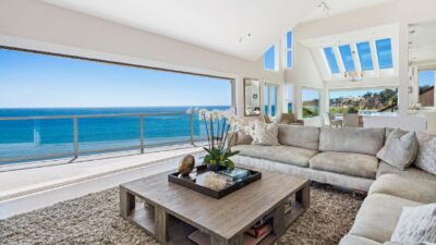 A look at the ocean through the inside of a house.