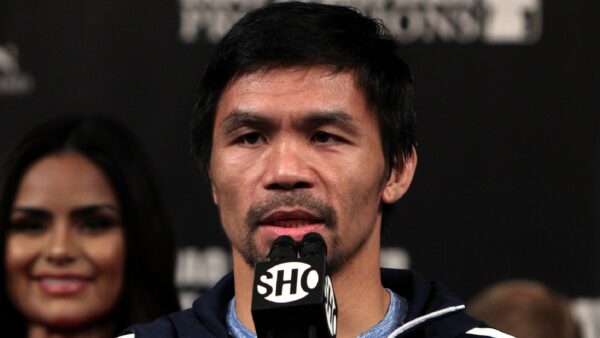 Manny Pacquiao in front of a microphone