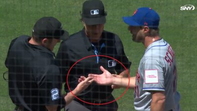 Max Scherzer has his hand checked