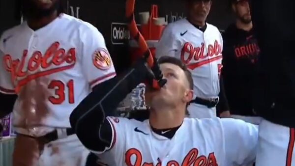 The Orioles drinking out of a funnel