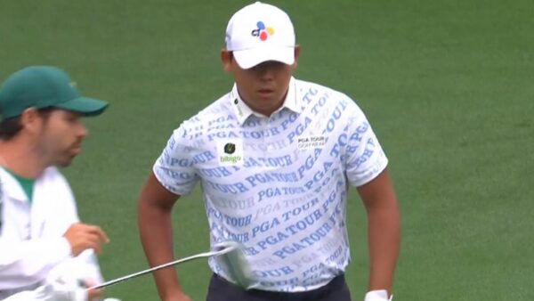 Si Woo Kim in a PGA Tour shirt