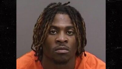 Michel Dukes poses for his mug shot