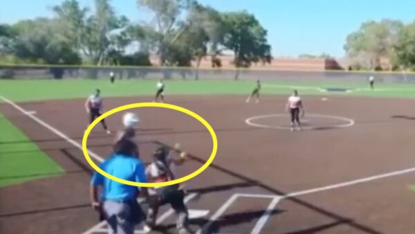 A softball catcher threw at a hitter's head