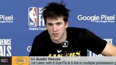 Austin Reaves at the podium