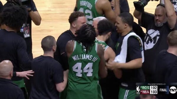 The Boston Celtics celebrating at the end of the game