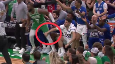 Georges Niang holds Jaylen Brown