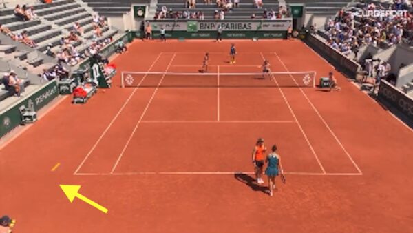 An errant ball hits a ball girl at the French Open