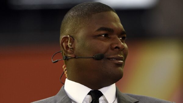 Keyshawn Johnson wearing a headset