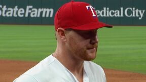 Kole Calhoun in a Rangers hat