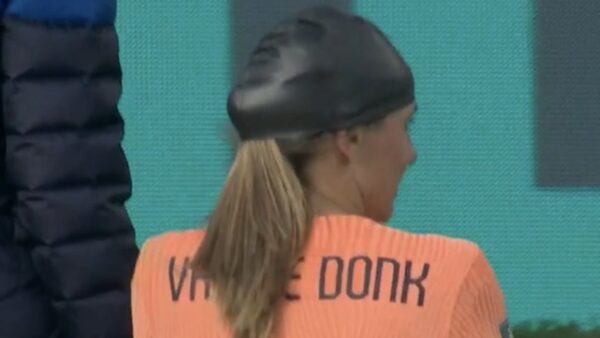 Danielle van de Donk wears a swim cap