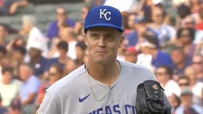 Zack Greinke smiling as he hears ex-Astros teammate Myles Straw playing Seminole Wind as his walk-up song
