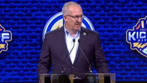 Greg Sankey on stage