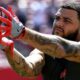 Mike Evans reaches to catch a ball