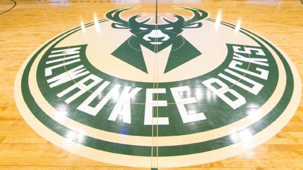 The Milwaukee Bucks logo at center court