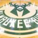 The Milwaukee Bucks logo at center court