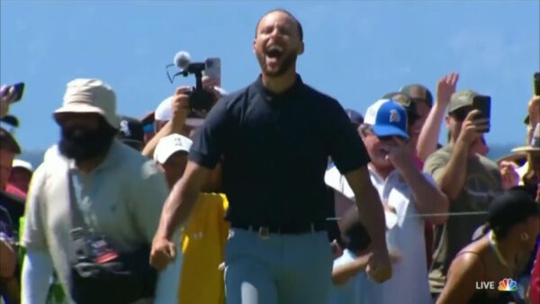 Steph Curry celebrating his golf win