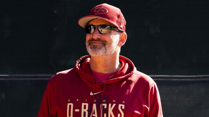 Torey Lovullo smiling in a Diamondbacks hoodie