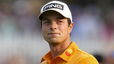 Viktor Hovland looks on