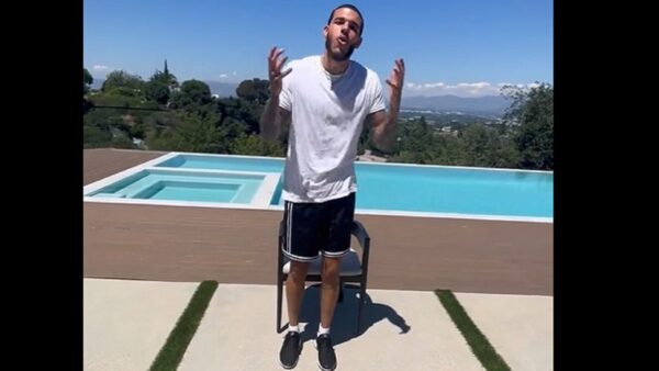 Lonzo Ball in front of a pool