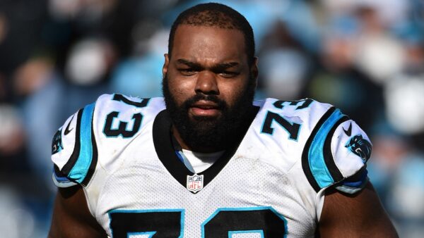 Michael Oher in Carolina Panthers uniform