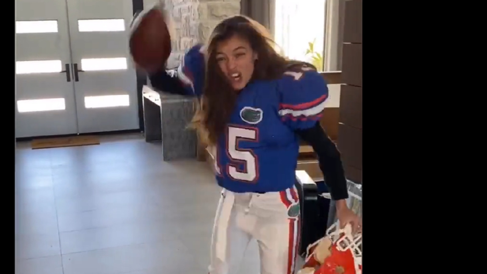 Tim Tebow's beauty queen wife does her best impression of QB's