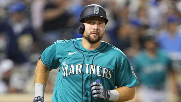 Mariners catcher Cal Raleigh in the middle of his home run trot