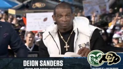 Deion Sanders stares into the camera