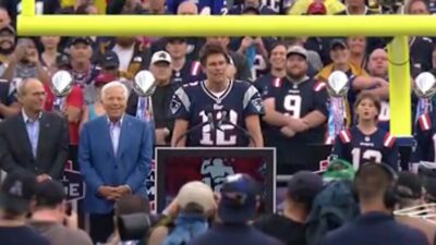 Tom Brady speaks at a ceremony